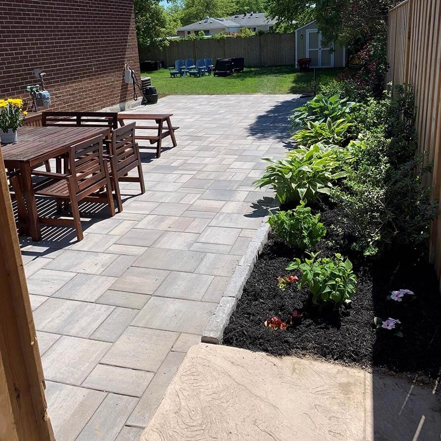 Backyard interlocking patio project in Forest Hill, image by OAKS Home Services