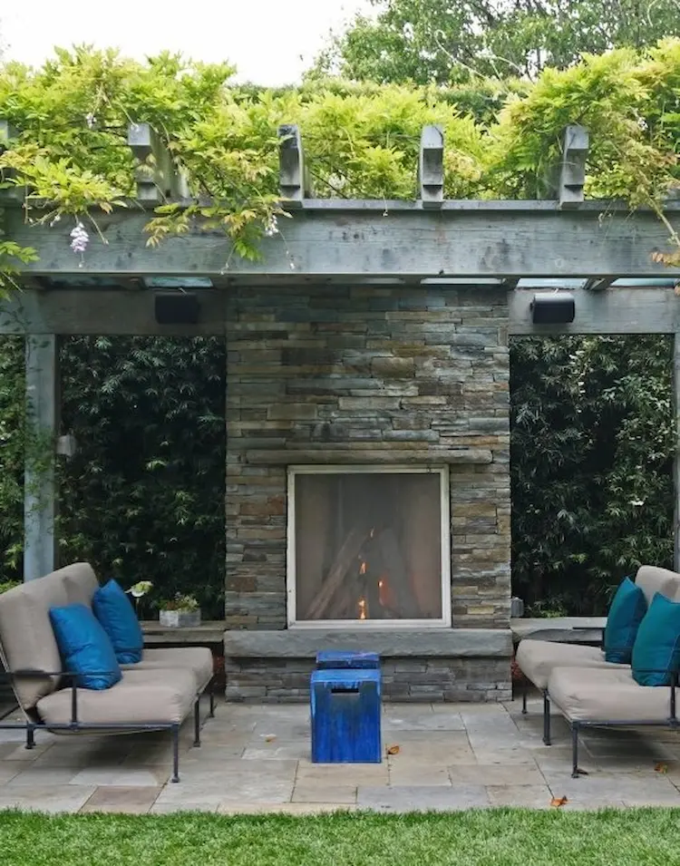 Backyard outdoor fireplace design and installation, image by OAKS Home Services