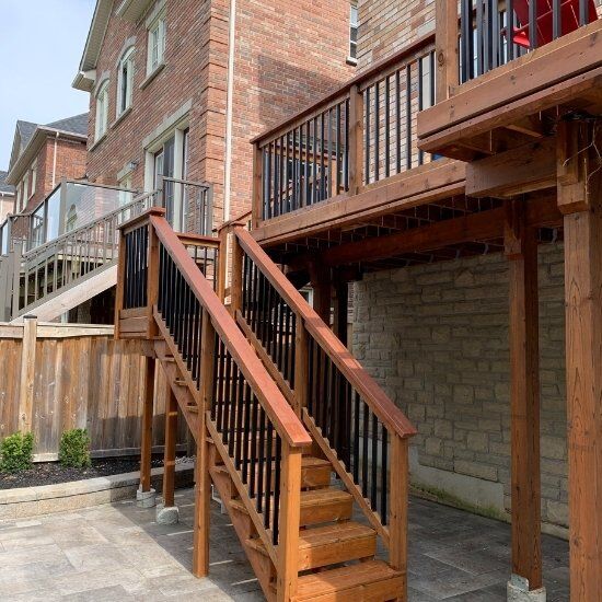decks-and-terraces-in-toronto Wooden deck in the backyard of a Toronto home.