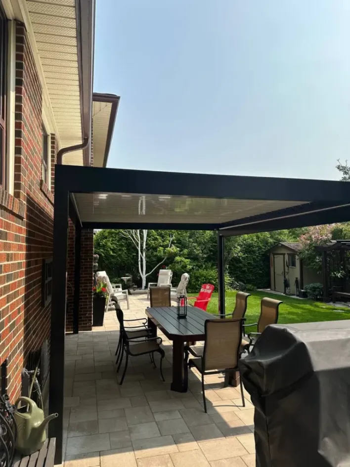 attached modern pergola over backyard patio with dining table and outdoor seating