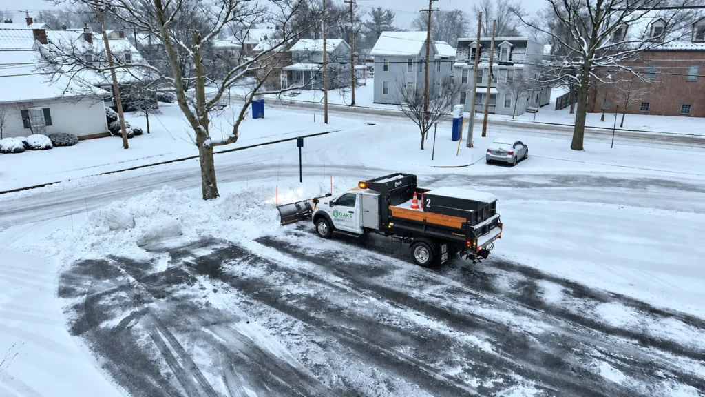 White Oaks RAM 5500 plowing a commercial parking lot, photo by Oaks