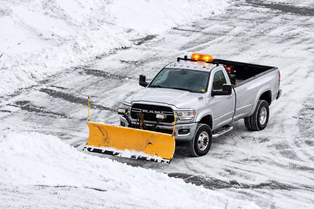 Silver Oaks RAM 5500 plowing a snowy parking lot, photo by Oaks