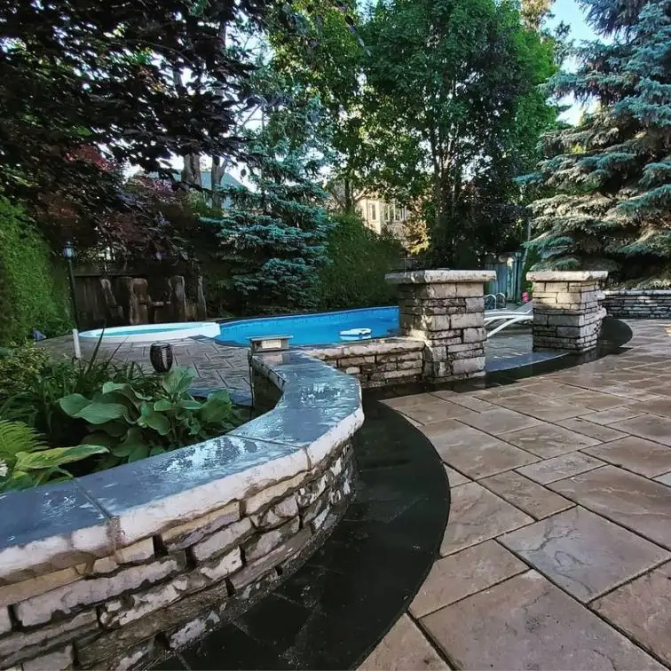 Retaining wall backyard design, image by OAKS Home Services