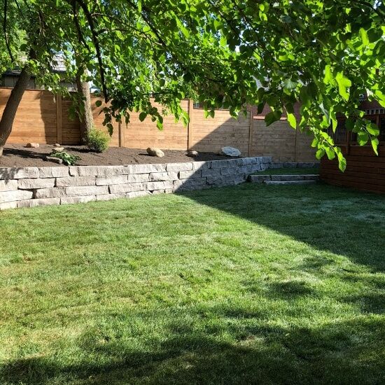 Backyard lawn and garden - Landscaping design from Oaks
