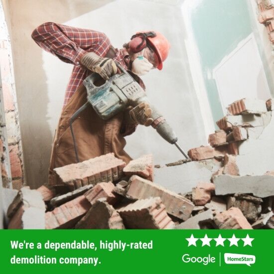Contractor demolishing a wall in a home.