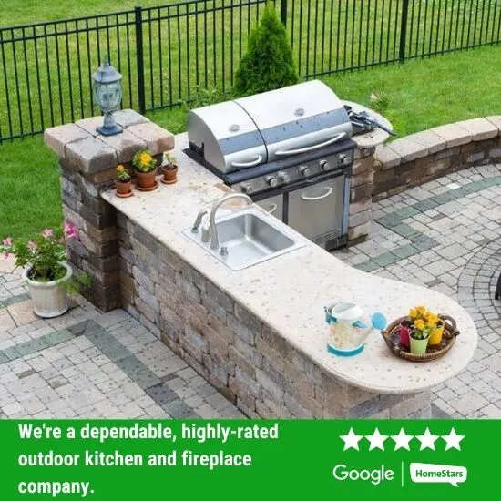 fireplaces-outdoor-kitchen-review-image Outdoor kitchen installed in a backyard.
