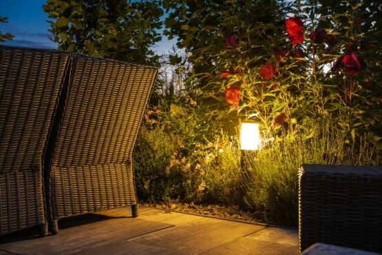 Landscape design with outdoor lighting and garden seating, image by oakshs.ca