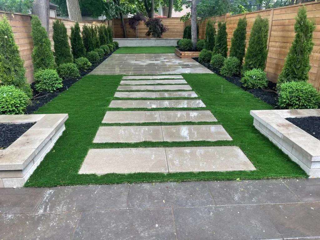 backyard stepping stone pathway with grass spacing modern landscaping and garden borders