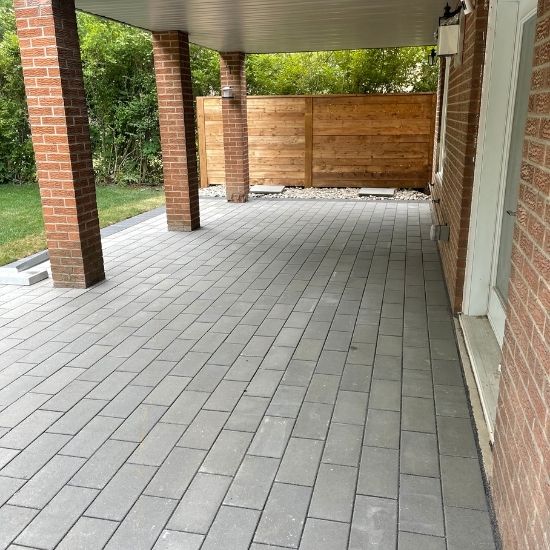 north york interlock installation in backyard completed project