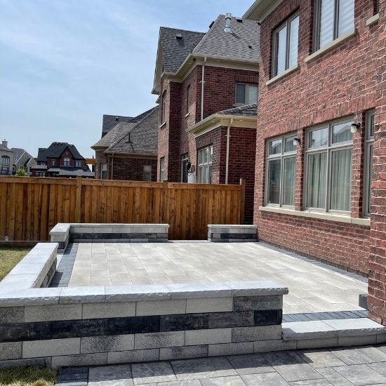 backyard interlocking aurora stone deck patio