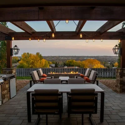 Small outdoor space with pergola lights and fire pit, image by oakshs.ca