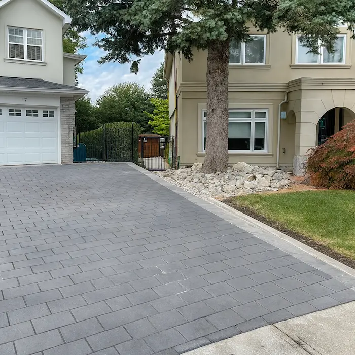 driveway-extension-company-1 Modern interlocking stone driveway extension with gray pavers, image by oakshs.ca