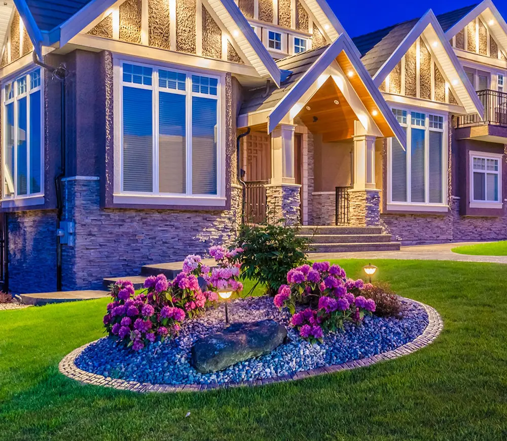 Landscape design with front yard garden and decorative lighting