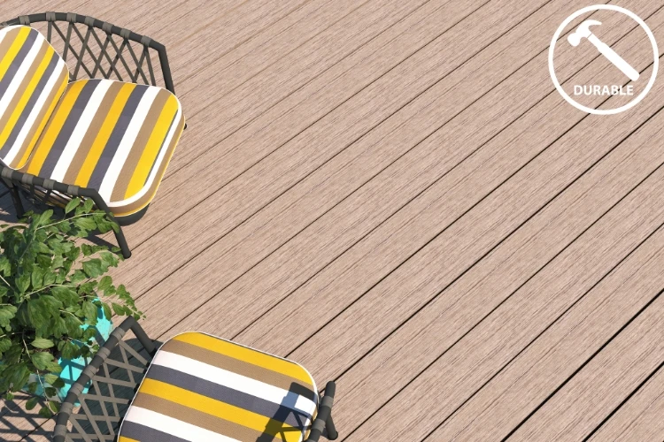 Top view of composite deck boards with striped outdoor chairs and durable icon badge