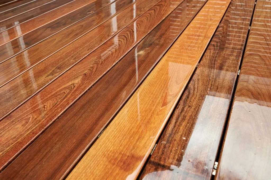 Sealed wooden deck boards with water-resistant finish protecting against rain and moisture