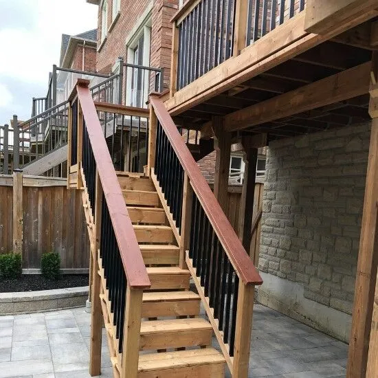 Wooden deck installed in the backyard of a home.